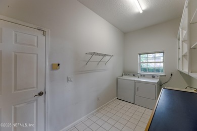 Come explore this stately two-story residence offering a blend on Queens Harbour Yacht and Country Club in Florida - for sale on GolfHomes.com, golf home, golf lot