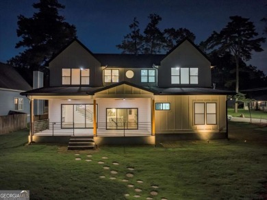 Step into flawless modern luxury at this brand-new custom-built on East Lake Golf Club in Georgia - for sale on GolfHomes.com, golf home, golf lot