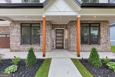 Step into flawless modern luxury at this brand-new custom-built on East Lake Golf Club in Georgia - for sale on GolfHomes.com, golf home, golf lot
