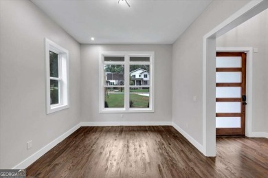 Step into flawless modern luxury at this brand-new custom-built on East Lake Golf Club in Georgia - for sale on GolfHomes.com, golf home, golf lot