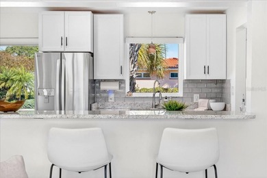 Waterfront living at its finest on highly desirable Vina Del Mar on Isla Del Sol Yacht and Country Club in Florida - for sale on GolfHomes.com, golf home, golf lot