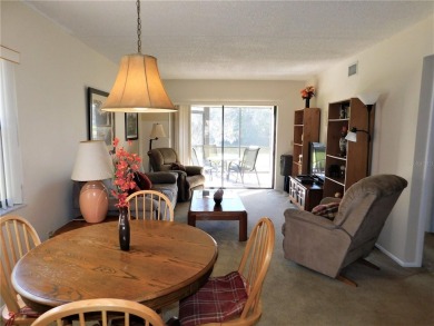 First floor end unit condo located in the Woodlake Run area of on East Lake Woodlands Country Club in Florida - for sale on GolfHomes.com, golf home, golf lot