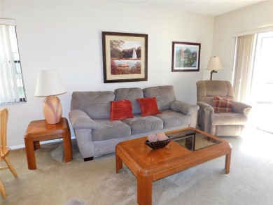 First floor end unit condo located in the Woodlake Run area of on East Lake Woodlands Country Club in Florida - for sale on GolfHomes.com, golf home, golf lot