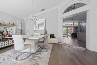 Experience luxury living in this stunning 4-bedroom, 3-bath pool on Westchase Golf Club in Florida - for sale on GolfHomes.com, golf home, golf lot