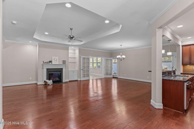 Experience refined coastal living in this beautifully designed on Cape Fear National At Brunswick Forest in North Carolina - for sale on GolfHomes.com, golf home, golf lot