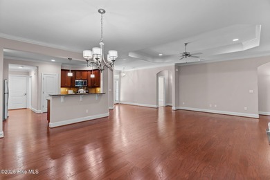 Experience refined coastal living in this beautifully designed on Cape Fear National At Brunswick Forest in North Carolina - for sale on GolfHomes.com, golf home, golf lot