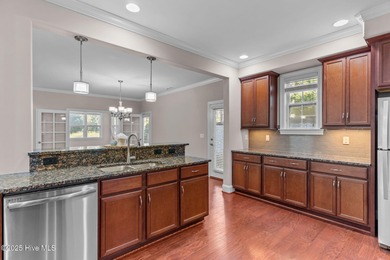 Experience refined coastal living in this beautifully designed on Cape Fear National At Brunswick Forest in North Carolina - for sale on GolfHomes.com, golf home, golf lot