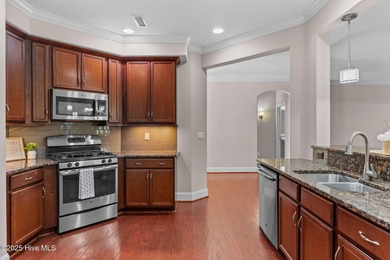 Experience refined coastal living in this beautifully designed on Cape Fear National At Brunswick Forest in North Carolina - for sale on GolfHomes.com, golf home, golf lot