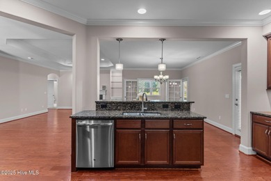 Experience refined coastal living in this beautifully designed on Cape Fear National At Brunswick Forest in North Carolina - for sale on GolfHomes.com, golf home, golf lot