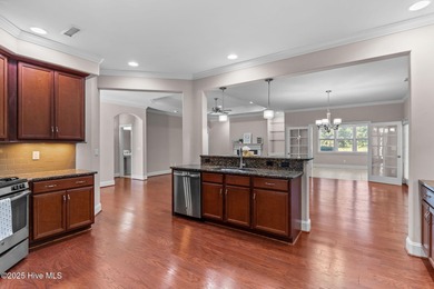 Experience refined coastal living in this beautifully designed on Cape Fear National At Brunswick Forest in North Carolina - for sale on GolfHomes.com, golf home, golf lot