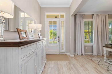 Discover refined Florida living in this beautifully updated pool on Esplanade Golf and Country at Lakewood Ranch in Florida - for sale on GolfHomes.com, golf home, golf lot