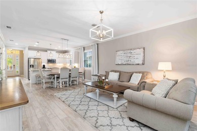 Discover refined Florida living in this beautifully updated pool on Esplanade Golf and Country at Lakewood Ranch in Florida - for sale on GolfHomes.com, golf home, golf lot