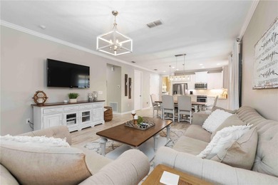 Discover refined Florida living in this beautifully updated pool on Esplanade Golf and Country at Lakewood Ranch in Florida - for sale on GolfHomes.com, golf home, golf lot