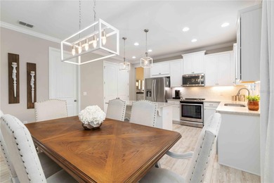 Discover refined Florida living in this beautifully updated pool on Esplanade Golf and Country at Lakewood Ranch in Florida - for sale on GolfHomes.com, golf home, golf lot