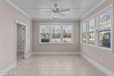 Experience refined coastal living in this beautifully designed on Cape Fear National At Brunswick Forest in North Carolina - for sale on GolfHomes.com, golf home, golf lot