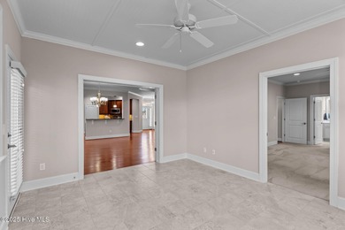 Experience refined coastal living in this beautifully designed on Cape Fear National At Brunswick Forest in North Carolina - for sale on GolfHomes.com, golf home, golf lot