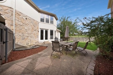 Tucked away on a quiet cul-de-sac, this spacious two-story home on Las Colinas Country Club in Texas - for sale on GolfHomes.com, golf home, golf lot
