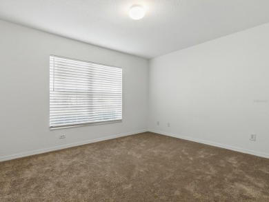 One or more photo(s) has been virtually staged. GREAT PRICE on on Eagle Ridge At Spruce Creek Country Club in Florida - for sale on GolfHomes.com, golf home, golf lot