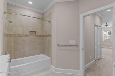 Experience refined coastal living in this beautifully designed on Cape Fear National At Brunswick Forest in North Carolina - for sale on GolfHomes.com, golf home, golf lot