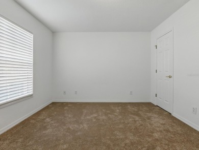 One or more photo(s) has been virtually staged. GREAT PRICE on on Eagle Ridge At Spruce Creek Country Club in Florida - for sale on GolfHomes.com, golf home, golf lot