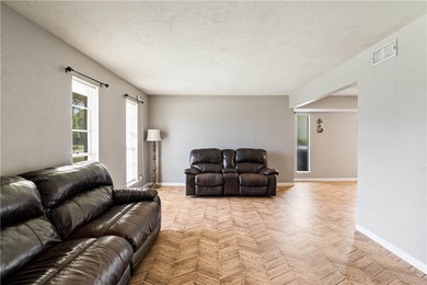 Located in the heart of Corpus Christi, this spacious two-story on Corpus Christi Country Club Golf Course in Texas - for sale on GolfHomes.com, golf home, golf lot