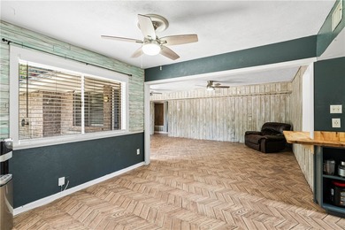 Located in the heart of Corpus Christi, this spacious two-story on Corpus Christi Country Club Golf Course in Texas - for sale on GolfHomes.com, golf home, golf lot