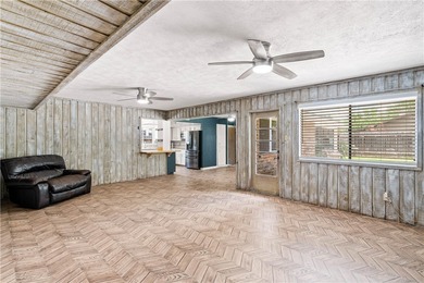 Located in the heart of Corpus Christi, this spacious two-story on Corpus Christi Country Club Golf Course in Texas - for sale on GolfHomes.com, golf home, golf lot