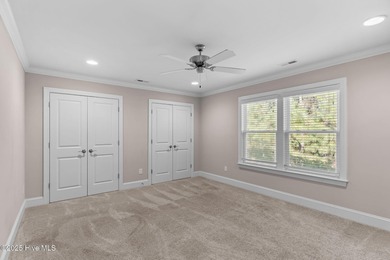 Experience refined coastal living in this beautifully designed on Cape Fear National At Brunswick Forest in North Carolina - for sale on GolfHomes.com, golf home, golf lot