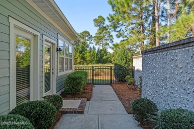 Experience refined coastal living in this beautifully designed on Cape Fear National At Brunswick Forest in North Carolina - for sale on GolfHomes.com, golf home, golf lot