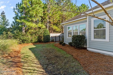 Experience refined coastal living in this beautifully designed on Cape Fear National At Brunswick Forest in North Carolina - for sale on GolfHomes.com, golf home, golf lot
