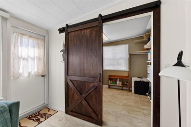 Welcome to this charming, tastefully updated 2-bedroom, 2-bath on North Lakes Golf Course in Florida - for sale on GolfHomes.com, golf home, golf lot