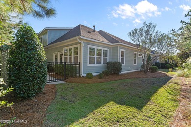Experience refined coastal living in this beautifully designed on Cape Fear National At Brunswick Forest in North Carolina - for sale on GolfHomes.com, golf home, golf lot
