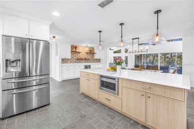 Welcome to Vina Del Mar's premier waterfront community, where on Isla Del Sol Yacht and Country Club in Florida - for sale on GolfHomes.com, golf home, golf lot