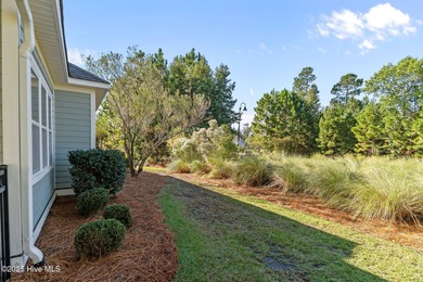 Experience refined coastal living in this beautifully designed on Cape Fear National At Brunswick Forest in North Carolina - for sale on GolfHomes.com, golf home, golf lot