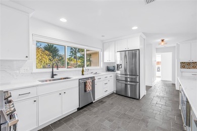 Welcome to Vina Del Mar's premier waterfront community, where on Isla Del Sol Yacht and Country Club in Florida - for sale on GolfHomes.com, golf home, golf lot