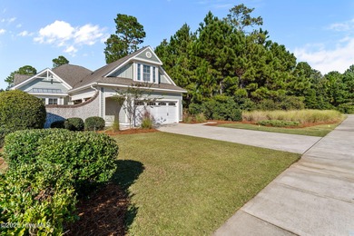 Experience refined coastal living in this beautifully designed on Cape Fear National At Brunswick Forest in North Carolina - for sale on GolfHomes.com, golf home, golf lot