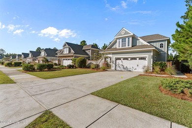 Experience refined coastal living in this beautifully designed on Cape Fear National At Brunswick Forest in North Carolina - for sale on GolfHomes.com, golf home, golf lot