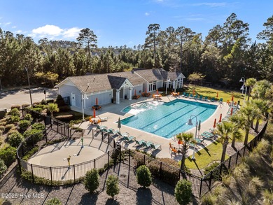 Experience refined coastal living in this beautifully designed on Cape Fear National At Brunswick Forest in North Carolina - for sale on GolfHomes.com, golf home, golf lot