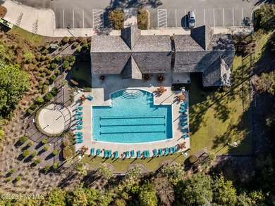Experience refined coastal living in this beautifully designed on Cape Fear National At Brunswick Forest in North Carolina - for sale on GolfHomes.com, golf home, golf lot