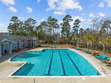 Experience refined coastal living in this beautifully designed on Cape Fear National At Brunswick Forest in North Carolina - for sale on GolfHomes.com, golf home, golf lot