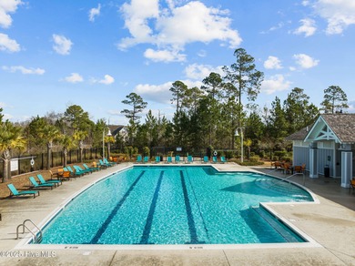Experience refined coastal living in this beautifully designed on Cape Fear National At Brunswick Forest in North Carolina - for sale on GolfHomes.com, golf home, golf lot