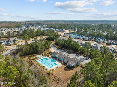 Experience refined coastal living in this beautifully designed on Cape Fear National At Brunswick Forest in North Carolina - for sale on GolfHomes.com, golf home, golf lot