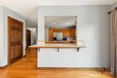 Nestled on a peaceful hilltop, this spacious 3-bedroom on Black Mountain Golf Course in North Carolina - for sale on GolfHomes.com, golf home, golf lot