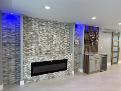 Beautifully renovated 2-bedroom, 2-bath first-floor corner unit on Wynmoor Golf Course in Florida - for sale on GolfHomes.com, golf home, golf lot