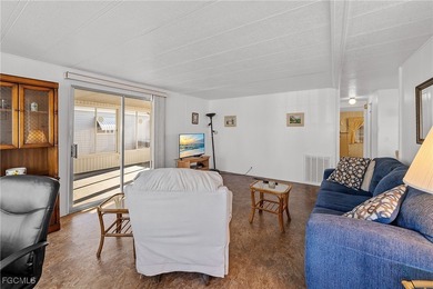 A great example of an affordable, well-cared-for, property in on Six Lakes Country Club in Florida - for sale on GolfHomes.com, golf home, golf lot