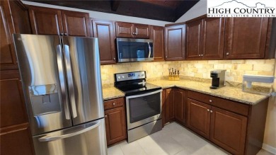 Enjoy stunning golf course views from this beautifully upgraded on Land Harbor Golf Course in North Carolina - for sale on GolfHomes.com, golf home, golf lot
