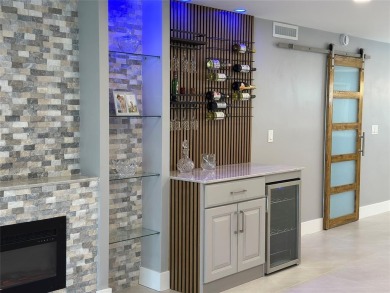 Beautifully renovated 2-bedroom, 2-bath first-floor corner unit on Wynmoor Golf Course in Florida - for sale on GolfHomes.com, golf home, golf lot