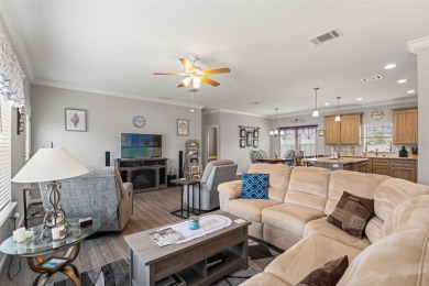 This beautifully maintained 3-bedroom, 2-bath home sits on a on Brookridge Country Club in Florida - for sale on GolfHomes.com, golf home, golf lot