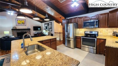 Enjoy stunning golf course views from this beautifully upgraded on Land Harbor Golf Course in North Carolina - for sale on GolfHomes.com, golf home, golf lot