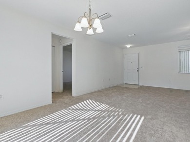 One or more photo(s) has been virtually staged. SELLER SAYS SELL on Eagle Ridge At Spruce Creek Country Club in Florida - for sale on GolfHomes.com, golf home, golf lot